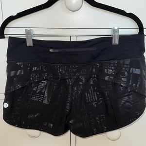 Lululemon Black With Metallic Writing 2.5 inch speed up shorts size 6